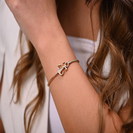 18K Gold Adventures Bracelet with Elegant Symbol Design