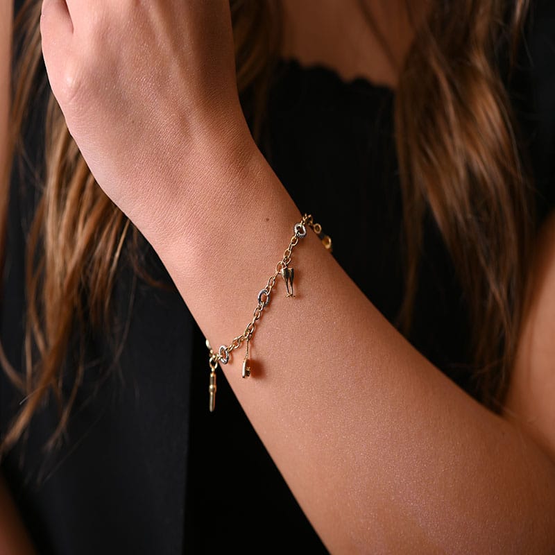 18K Gold Bracelet with Assorted Shape Charms