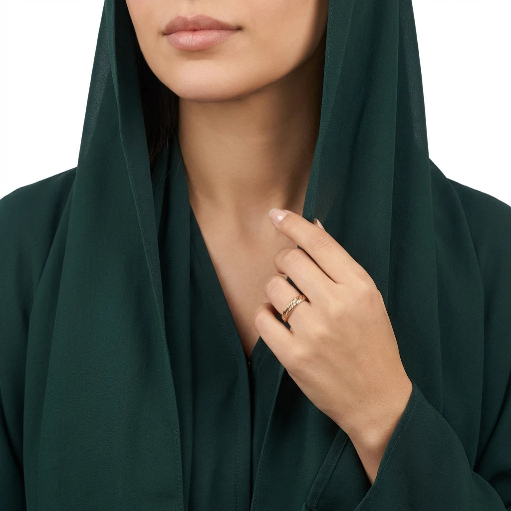 دبلة ذهب عيار 18 بتصميم مضفّر