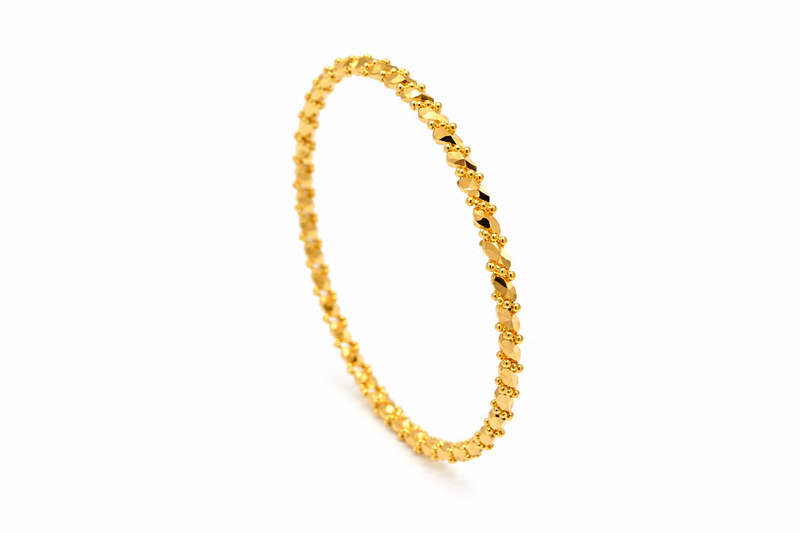 21K gold bangle with a twisted design