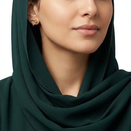 حلق ذهب عيار 18 بتصميم القلب المزدهر