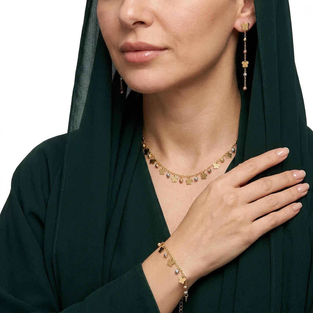 نصف طقم ذهب عيار 18 بلمسة زهرية متناغمة