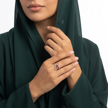 خاتم ذهب عيار18بتصميم كروس بفص ملون بالمنتصف
