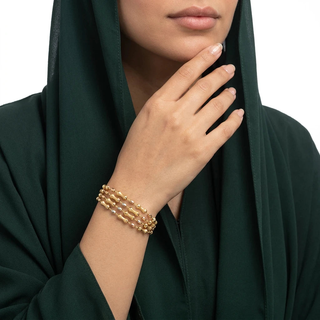 اسوارة ذهب عيار 18 بتصميم مجدول في المنتصف