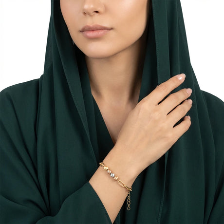 اسوارة ذهب عيار 18 بتصميم جنزير ناعم مع خرز