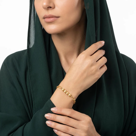 اسوارة ذهب عيار 18 بتصميم جنزير مع كرات مضلعة