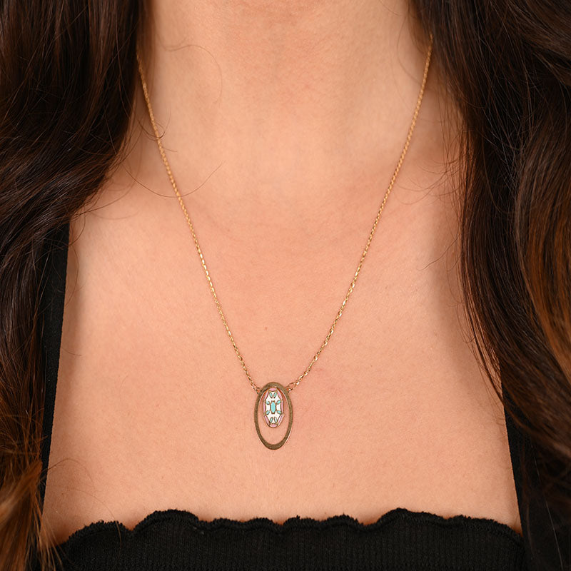 18K Gold Necklace with Ornate Oval Pendant