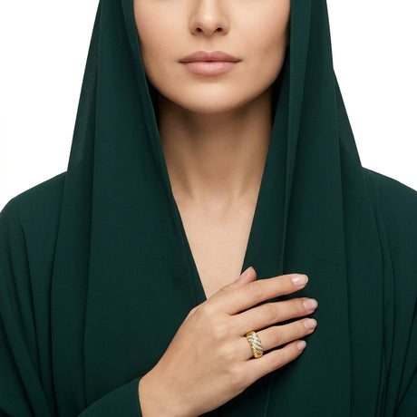 خاتم ذهب عيار 18 تصميم ملتوي مرصع