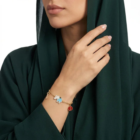 أنسيال ذهب عيار 18 بتعليقات متنوعة