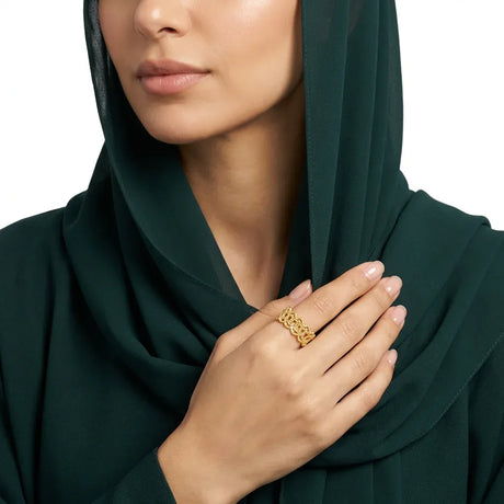 خاتم ذهب عيار 18 بحبات من لؤلؤ بتصميم ملتف