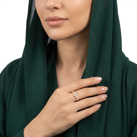 خاتم كورازون ذهب عيار 18 بقلب مرصع ومتعرجة