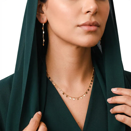 نصف طقم ذهب عيار 18 بلمسة تعليقات هندسية