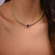 18K gold set with red stones