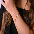 18K Gold Bracelet with Assorted Shape Charms