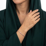 انسيال ذهب عيار 18 بتصميم حجر فوشيا لامع