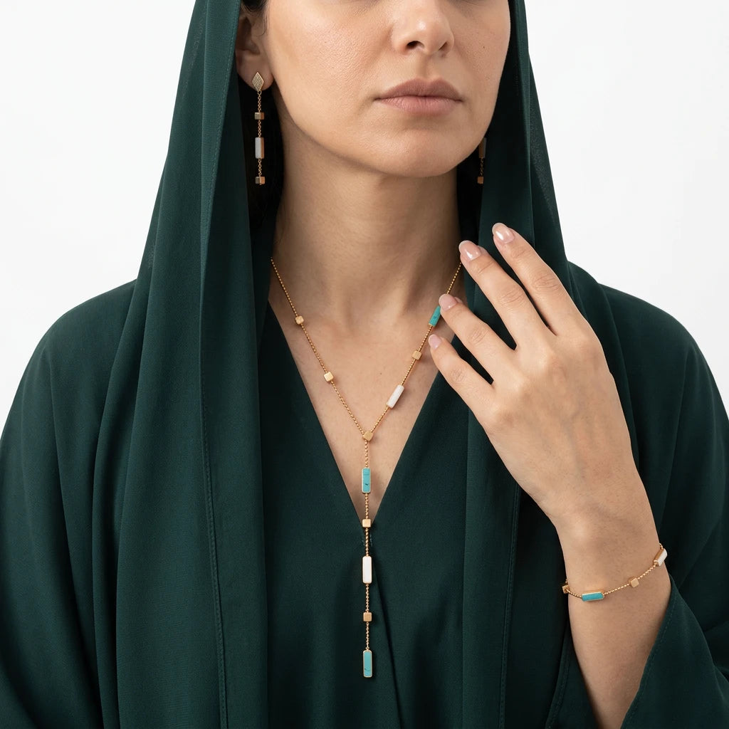 نصف طقم ذهب عيار 18 بتعليقات انسيابية
