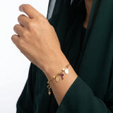 18K Gold Bracelet with Key and Dangling Charms