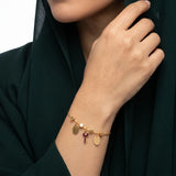 18K Gold Bracelet with Key and Dangling Charms