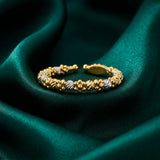 18K Gold Ring with Paved Design