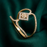 18K Gold Ring with Unique Design and Sparkling Stones