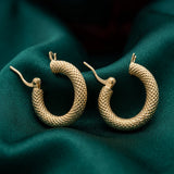 18K Gold Earrings with Circular Braided Design