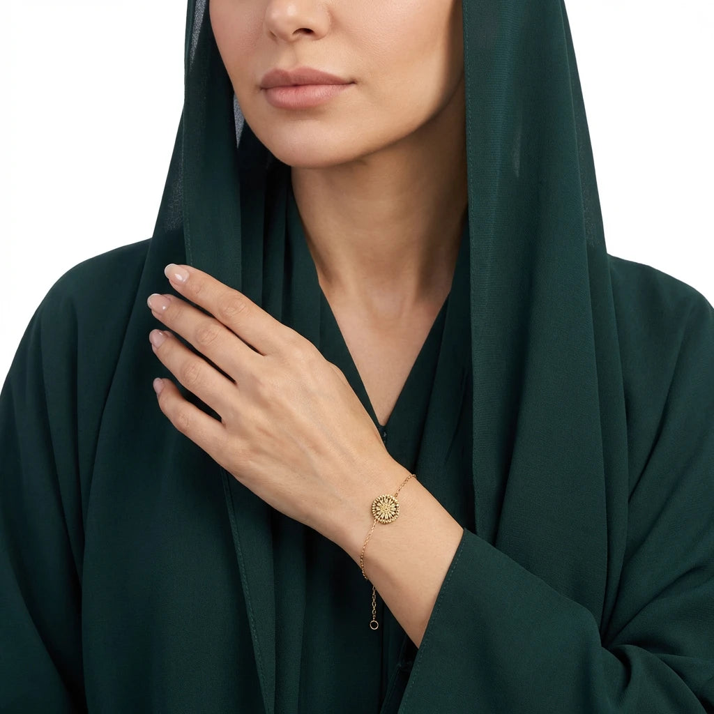 أسوارة ذهب عيار 18 بتصميم تعليقة عملة