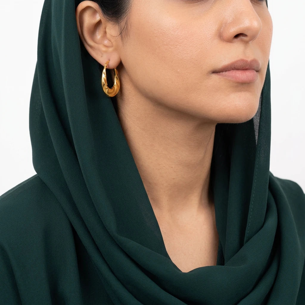 حلق ذهب عيار 21 تصميم منحني بارز