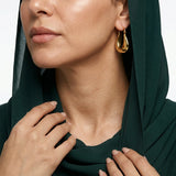 حلق ذهب عيار 21 تصميم منحني بارز