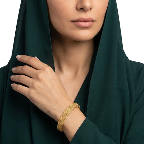 اسورة من الذهب عيار 18 بتصميم بسيط