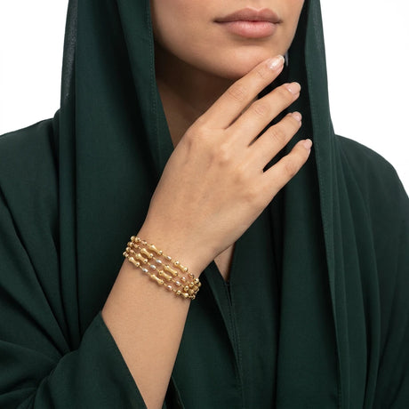 اسوارة ذهب عيار 18 بتصميم مجدول في المنتصف