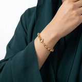 اسوارة ذهب عيار 18 بتصميم مجدول متشابك