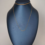 18-karat gold necklace: The epitome of simplicity