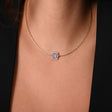 Half-set of 18K gold, studded clasp.
