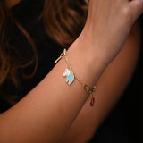 أنسيال ذهب عيار 18 بتعليقات متنوعة