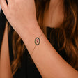 18K Gold Bracelet with Circular Charm and Red Flower