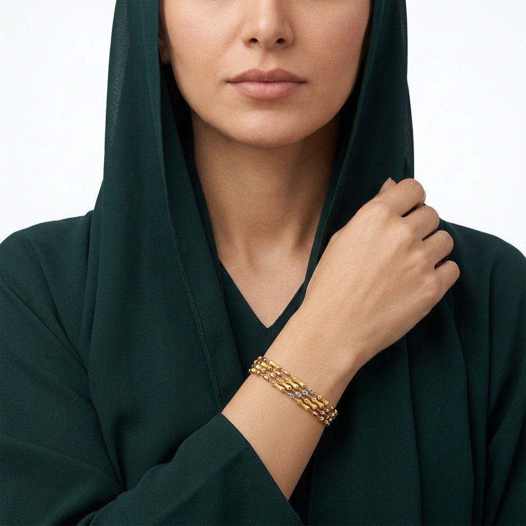 أسورة ذهب عيار 18 بتصميم ضفيرة وسطية