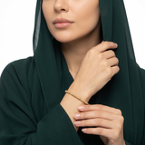 اسوارة ذهب عيار 18 بتصميم حبات الخرز المتلألئة