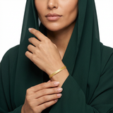 18K Gold Bracelet with Flexible Fluid Design and Delicate Pendant
