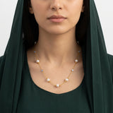 عقد ذهب عيار 18 بتصميم لؤلؤ ناعم