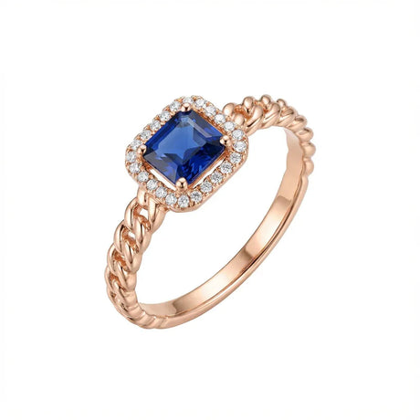 18K Gold Ring with Paved Blue Stone