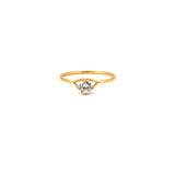 18K Gold Ring with Small Sparkling Stone Design