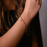 18K Gold Bracelet Interwoven with Heart Pendants