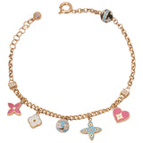 18K Bracelet with Assorted Shapes Design
