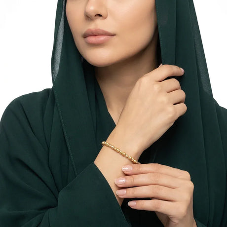 أسورة  ذهب عيار 18 بتصميم مزين بالخرز