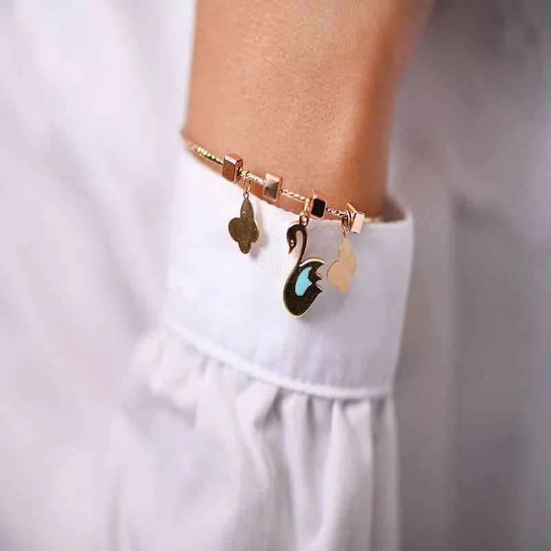 18K Gold Kids bracelet with Swan Design