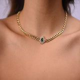 18K gold set with a green stone chain design
