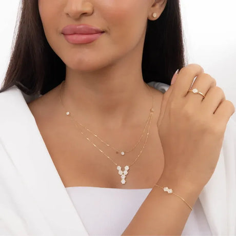18K gold set with geometric design and stones