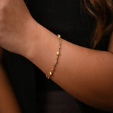 أسورة ذهب عيار 18 بتصميم دوائر صغيرة كلاسيكية