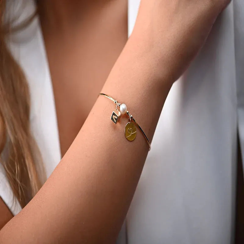 18K bracelet with Multiple charms Design