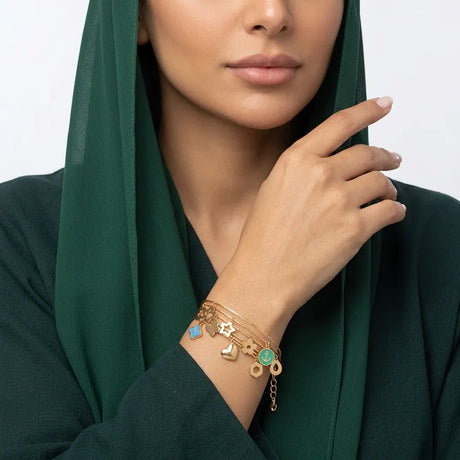 أسورة  ذهب عيار 18 بتصميم سلم موسيقي